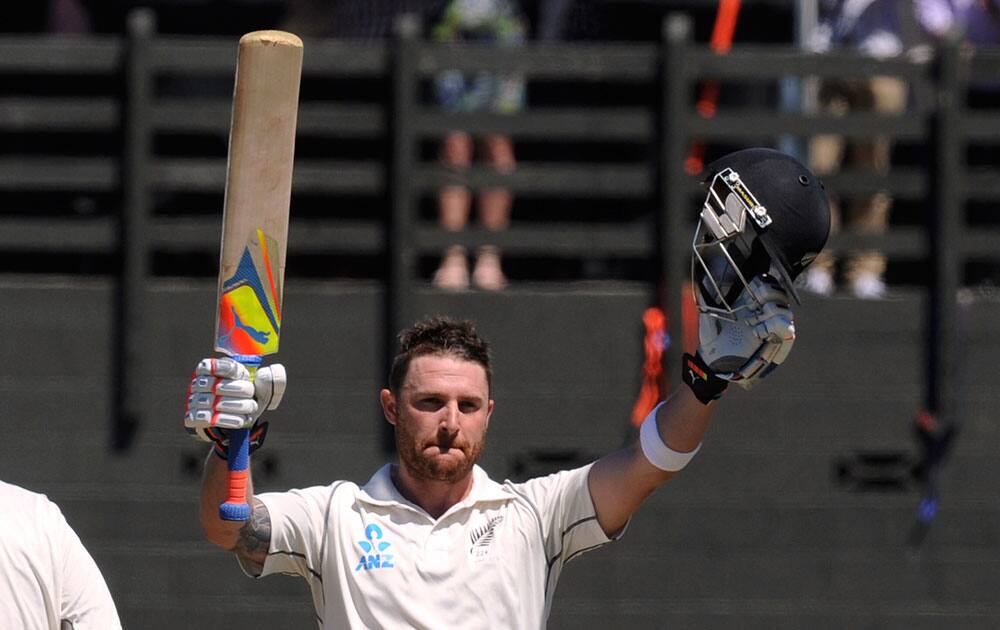New Zealand’s Brendon McCullum celebrates his double century in the second innings against India on the fourth day of the second cricket test at Basin Reserve in Wellington, New Zealand.