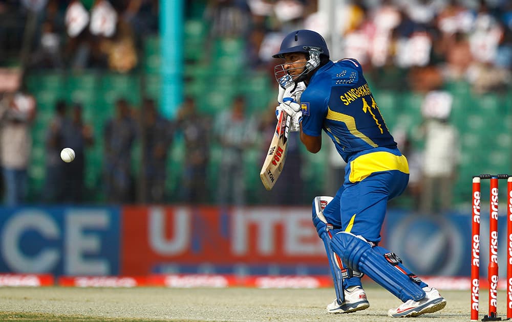 Sri Lanka’s Kumar Sangakkara plays a shot during the opening match of the Asia Cup one-day international cricket tournament against Pakistan in Fatullah, near Dhaka, Bangladesh.