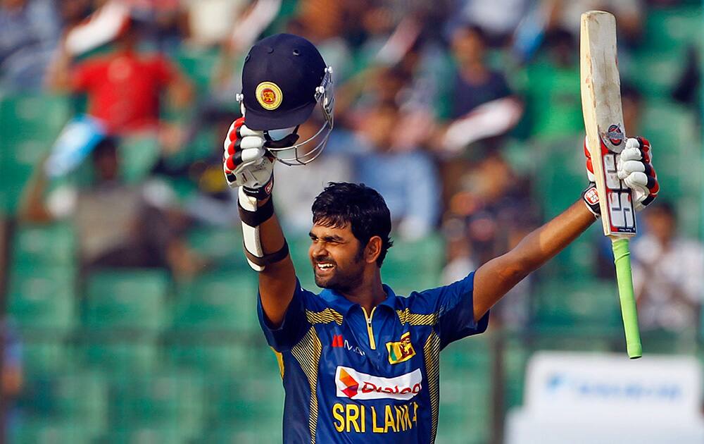 Sri Lanka’s Lahiru Thirimanne acknowledges the crowd after scoring a century during the opening match of the Asia Cup one-day international cricket tournament against Pakistan in Fatullah, near Dhaka, Bangladesh.