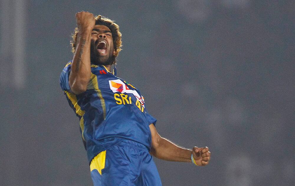 Sri Lanka’s Lasith Malinga, celebrates taking the wicket of Pakistan’s Bilawal Bhatti during the opening match of the Asia Cup one-day international cricket tournament between them in Fatullah, near Dhaka, Bangladesh.