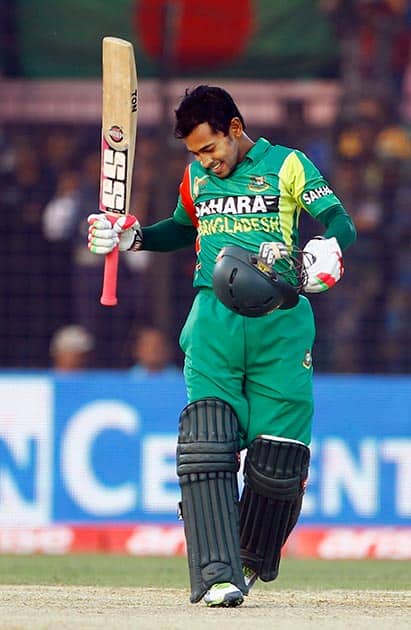 Bangladesh's Mushfiqur Rahim celebrates after scoring a century during the Asia Cup one-day international cricket tournament against India in Fatullah, near Dhaka, Bangladesh.