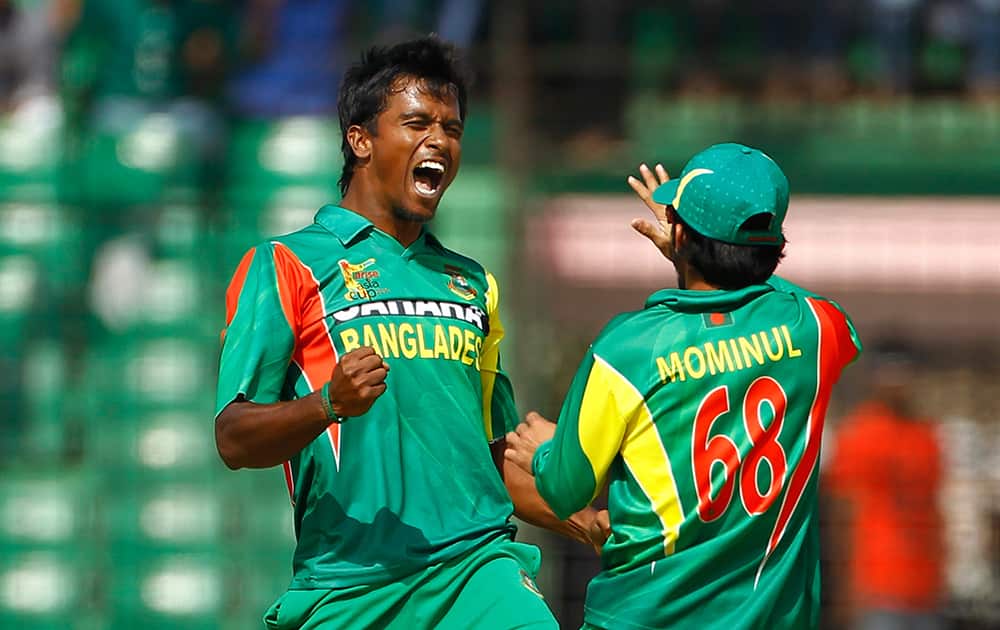 Bangladesh’s Rubel Hossain celebrates taking the wicket of Afghanistan’s Mohammad Shahzad during the Asia Cup one-day international cricket tournament between them in Fatullah, near Dhaka, Bangladesh.