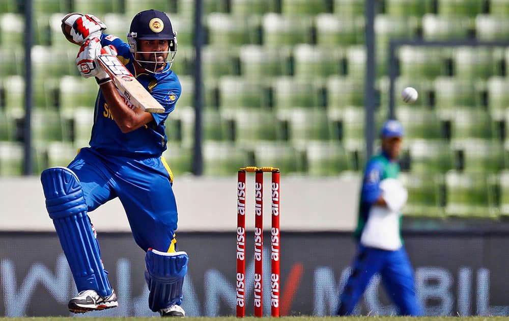 Sri Lanka’s Lahiru Thirimanne plays a shot during the Asia Cup one-day international cricket tournament against Afghanistan in Dhaka.