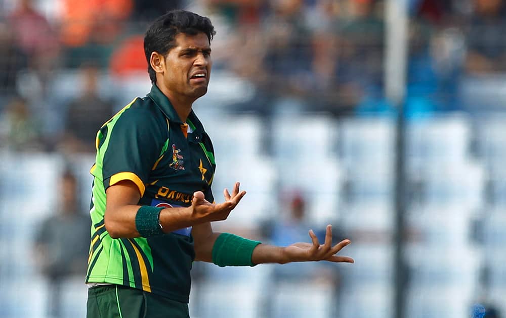 Pakistan’s Mohammad Talha gestures as he successfully appeals to dismiss Bangladesh’s Imrul Kayes during their match in the Asia Cup one-day international cricket tournament in Dhaka, Bangladesh.