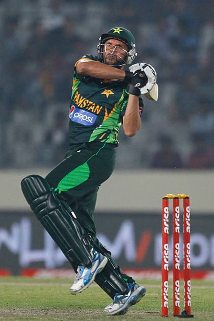 Pakistan’s Shahid Afridi, plays a shot during their match against Bangladesh in the Asia Cup one-day international cricket tournament in Dhaka, Bangladesh.