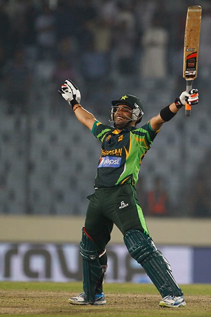 Pakistan’s Umar Akmal celebrates after winning their match against Bangladesh in the Asia Cup one-day international cricket tournament in Dhaka, Bangladesh.