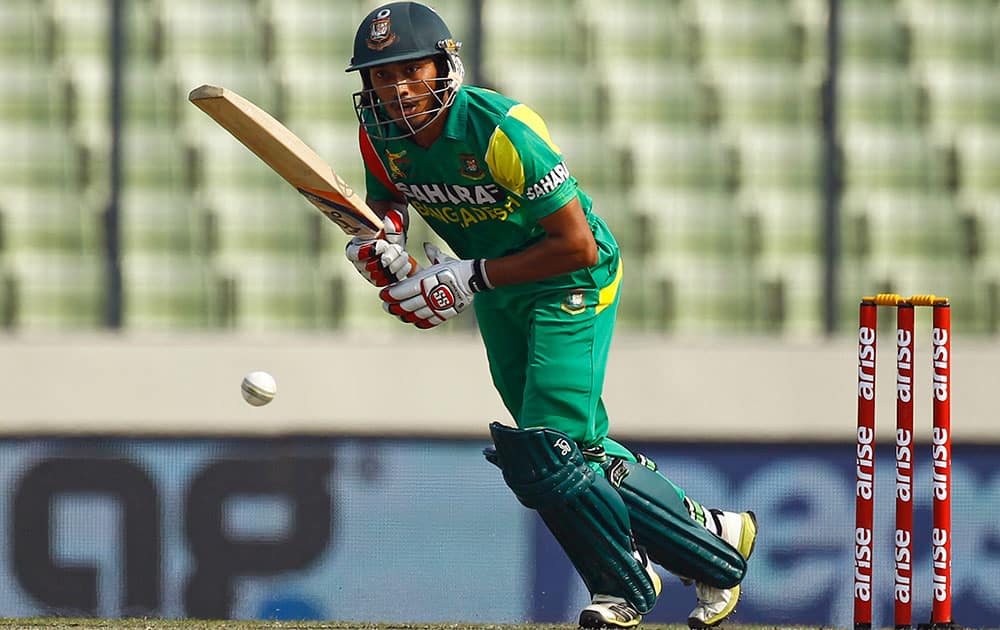 Bangladeshi cricket player Anamul Haque looks at the ball after batting during the Asia Cup one-day international cricket tournament against Sri Lanka in Dhaka.