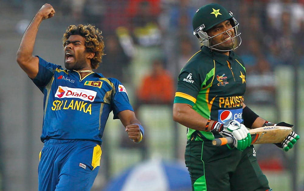 Sri Lanka’s Lasith Malinga celebrates taking the wicket of Pakistan’s Umar Akmal during their Asia Cup final cricket match in Dhaka, Bangladesh.