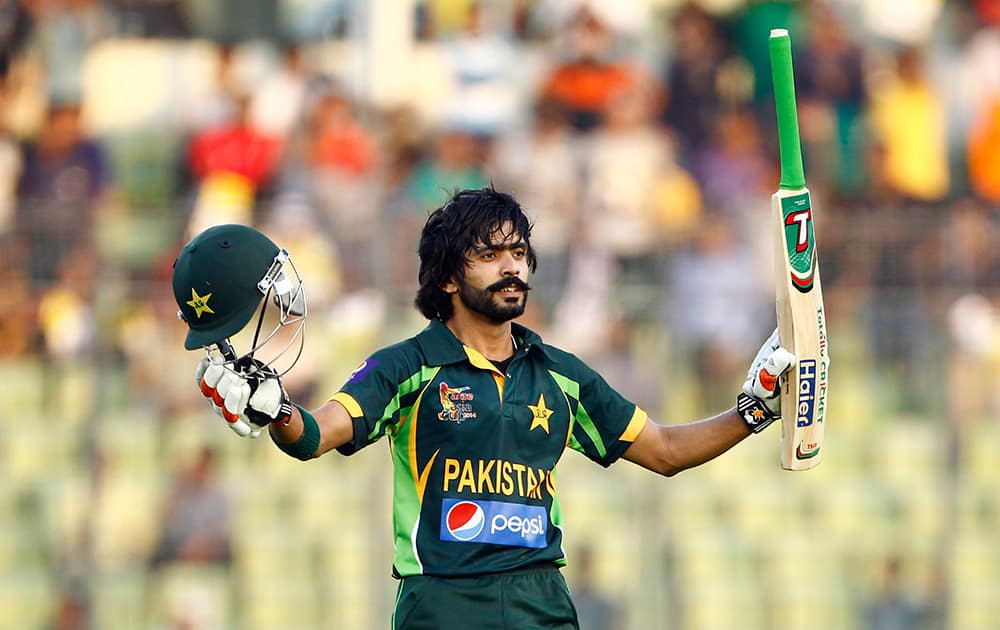 Pakistan’s cricket player Fawad Alam celebrates after scoring a century against Sri Lanka during their Asia Cup final cricket match in Dhaka, Bangladesh.