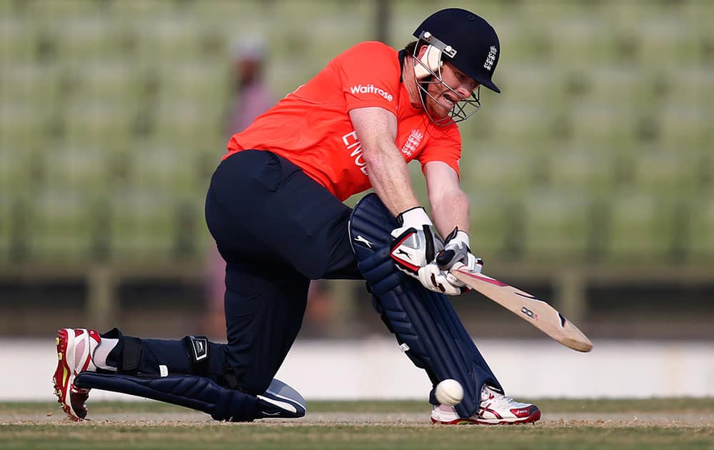 England batsman Eoin Morgan plays a shot during their ICC Twenty20 Cricket World Cup warm up match against West Indies' in Fatullah on the outskirts of Dhaka, Bangladesh.