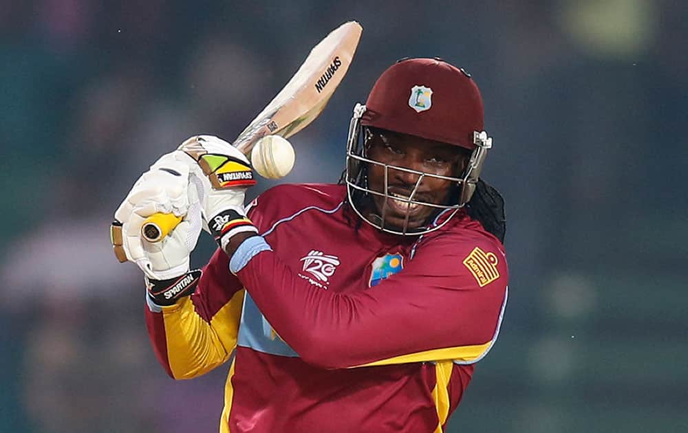 West Indies' batsman Chris Gayle plays a shot during their ICC Twenty20 Cricket World Cup warm up match against England in Fatullah on the outskirts of Dhaka