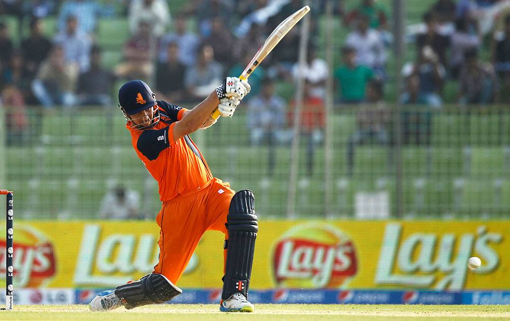The Netherlands Tom Cooper plays a shot during their ICC Twenty20 Cricket World Cup match against Zimbabwe in Sylhet, Bangladesh.