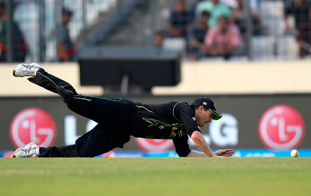 Australia's captain George Bailey misses to field the ball after a shot played by Pakistan batsman during their ICC Twenty20 Cricket World Cup match in Dhaka.