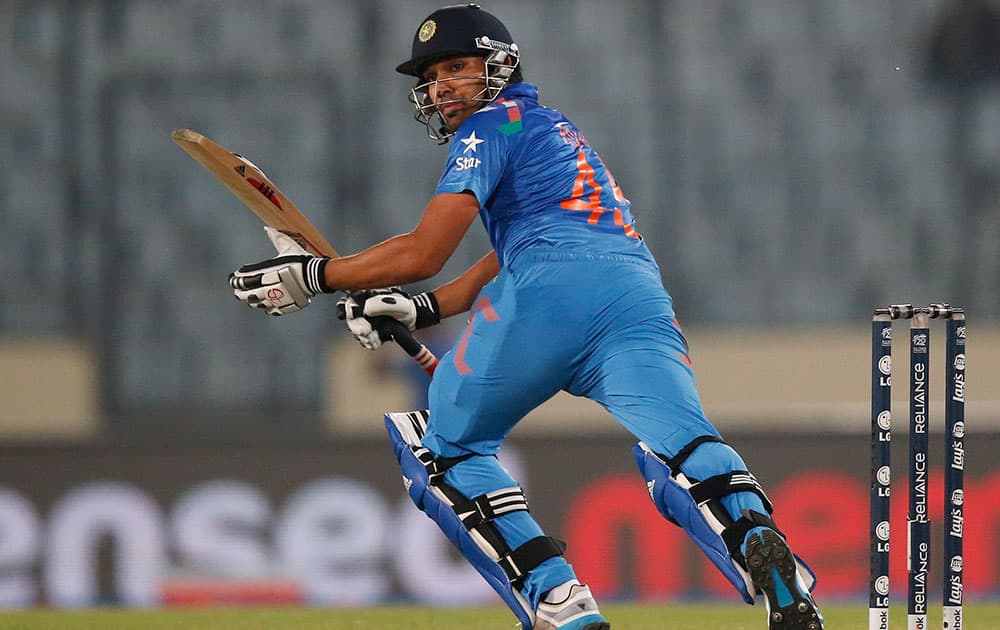 India's batsman Rohit Sharma watches his shot during their ICC Twenty20 Cricket World Cup match against West Indies' in Dhaka.