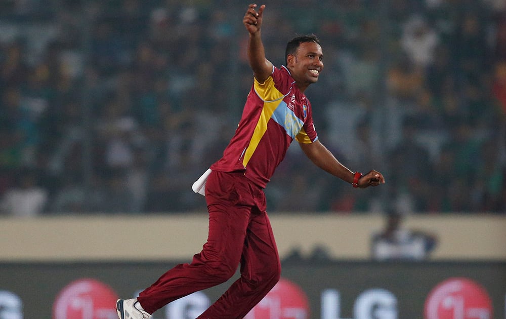 West Indies' bowler Samuel Badree celebrates the dismissal of Bangladesh batsman Mahmudullah during their ICC Twenty20 Cricket World Cup match in Dhaka, Bangladesh.