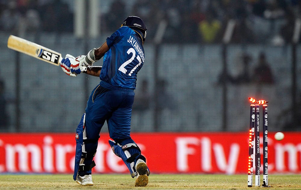 Sri Lanka's Mahela Jayawardena is bowled out by England's Chris Jordan during their ICC Twenty20 Cricket World Cup match in Chittagong, Bangladesh.