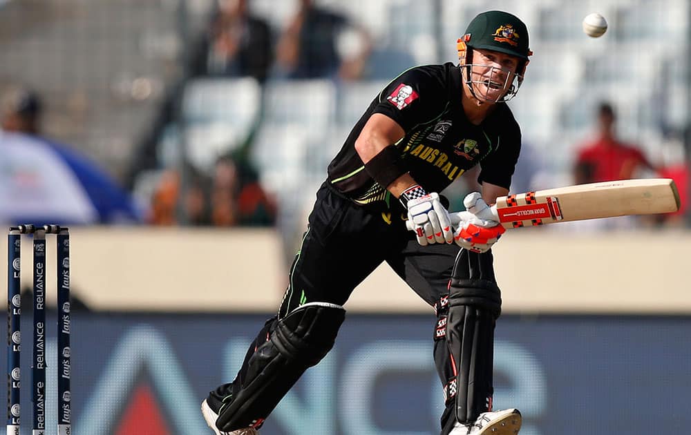 Australia's batsman David Warner plays a shot during their ICC Twenty20 Cricket World Cup match against West Indies in Dhaka, Bangladesh.
