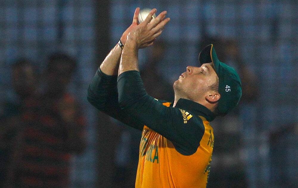 South Africa's David Miller takes a catch to dismiss England's Ravi Bopara during their ICC Twenty20 Cricket World Cup match in Chittagong, Bangladesh.