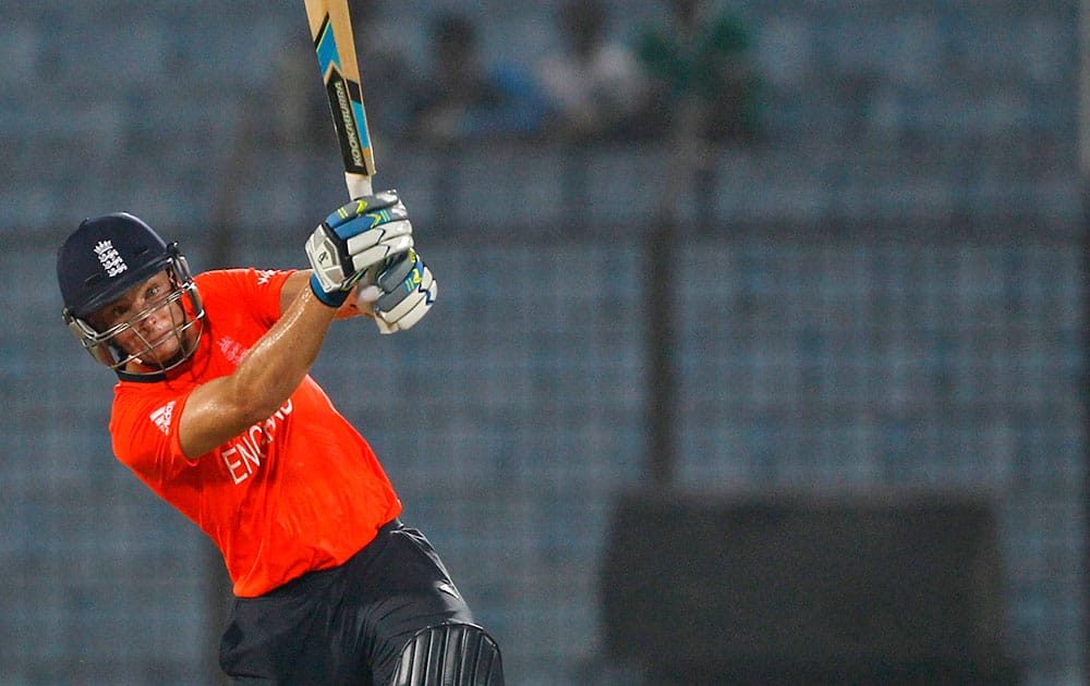 England's Jos Buttler plays a shot during the ICC Twenty20 Cricket World Cup match against South Africa in Chittagong, Bangladesh.