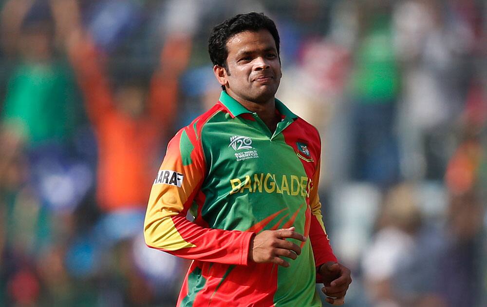Bangladesh bowler Abdur Razzak celebrates the dismissal of Pakistan's captain Mohammad Hafeez during their ICC Twenty20 Cricket World Cup match in Dhaka, Bangladesh.