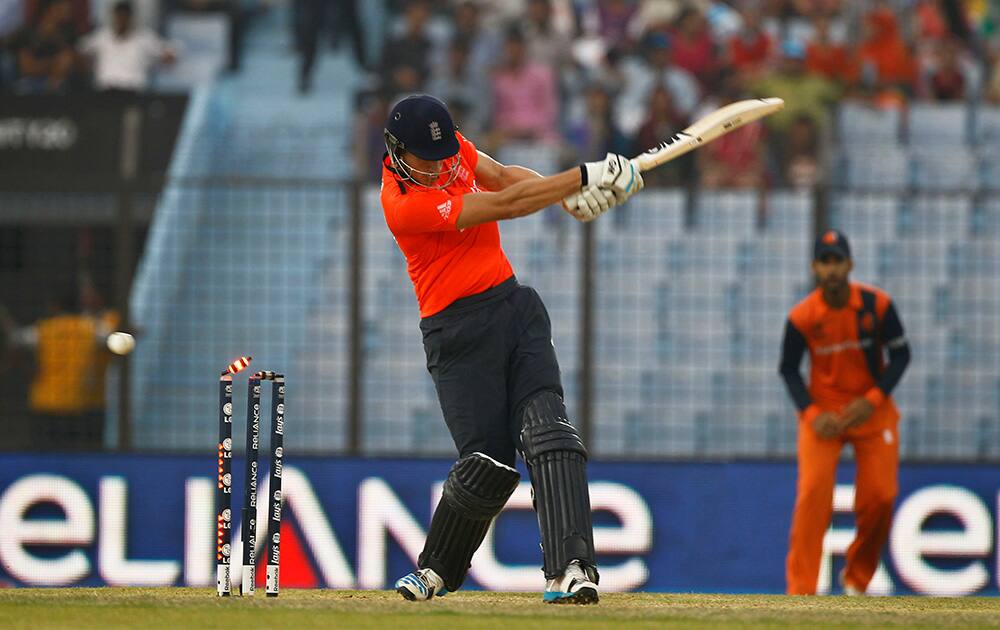 England's Alex Hales is bowled out by Netherlands's Mudassar Bukhari during their ICC Twenty20 Cricket World Cup match in Chittagong, Bangladesh.