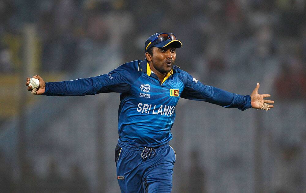 Sri Lanka's Mahela Jayawardena celebrates after taking a catch off New Zealand's Trent Boult during their ICC Twenty20 Cricket World Cup matchin Chittagong, Bangladesh.