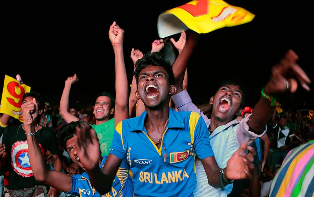 Sri Lanka cricket fans react as they watch on television in Colombo, Sri Lanka, the ICC Twenty20 Cricket World Cup final in Dhaka.