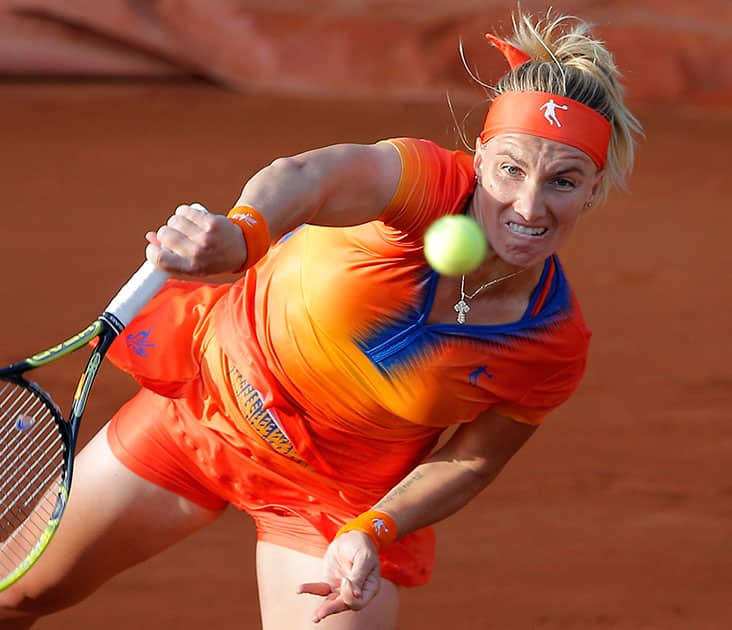 Russia's Svetlana Kuznetsova serves the ball to Lucie Safarova of the Czech Republic during their fourth round match of the French Open tennis tournament at the Roland Garros stadium, in Paris, France.