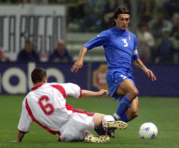 Paolo Maldini: Maldini was appointed Italy's full-time captain in 1994. Italy reached the final of Euro 2000, but lost to France in extra time. Immediately after Italy were eliminated in the 2002 World Cup round of 16, Maldini retired trophyless as Italy's most capped player.