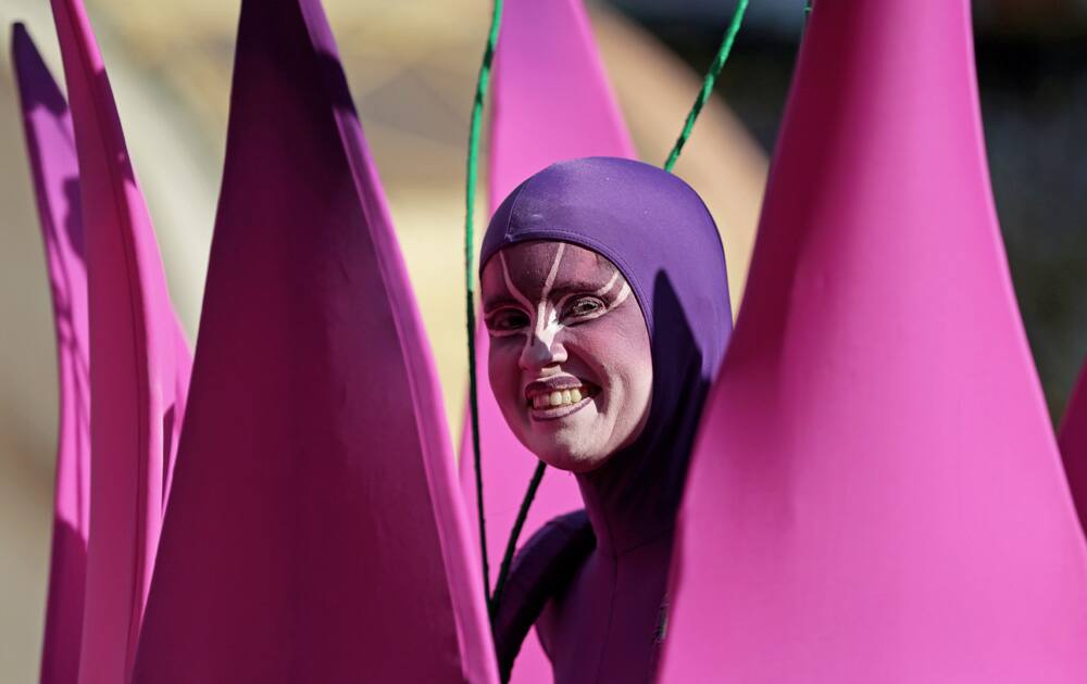 An actor performs during the opening ceremony before the group A World Cup soccer match between Brazil and Croatia, the opening game of the tournament, in the Itaquerao Stadium in Sao Paulo, Brazil.