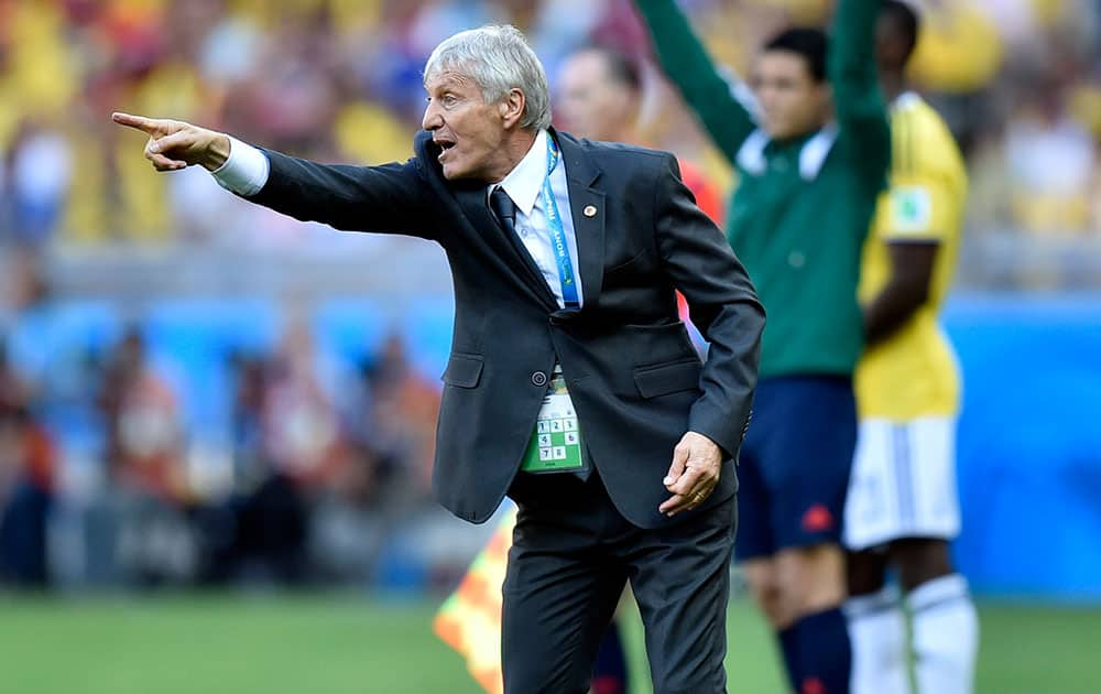 Colombia's head coach Jose Pekerman yells from the sideline during the group C World Cup soccer match between Colombia and Greece at the Mineirao Stadium in Belo Horizonte, Brazil.