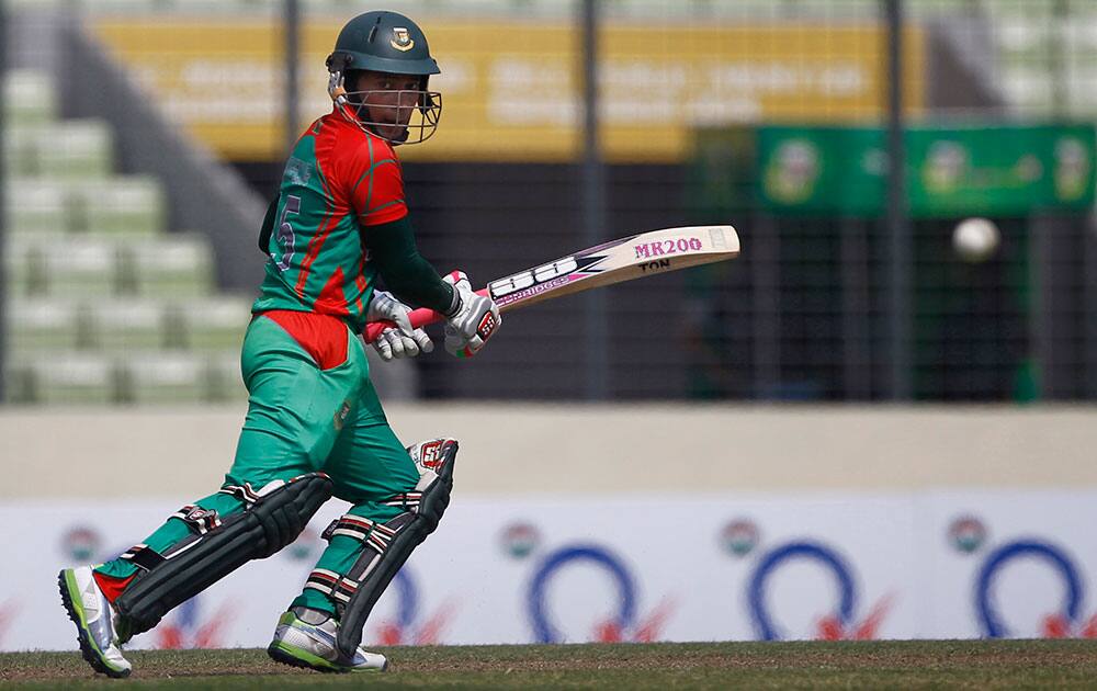 Bangladesh captain Mushfiqur Rahim plays a shot during their first one-day International cricket match against India in Dhaka.