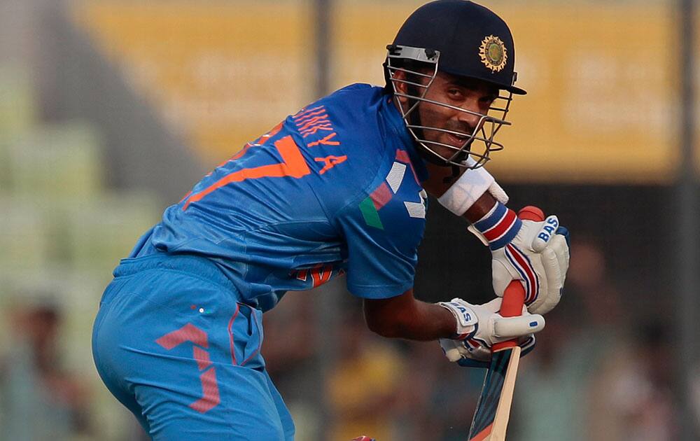 India's Ajinkya Rahane plays a shot during their first one-day International cricket match against Bangladesh in Dhaka, Bangladesh.