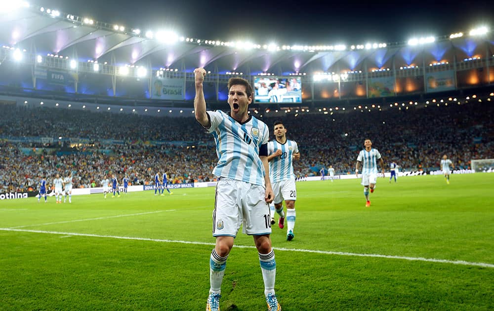 Argentina's Lionel Messi celebrates scoring his side's second goal during the group F World Cup soccer match between Argentina and Bosnia at the Maracana Stadium in Rio de Janeiro, Brazil.