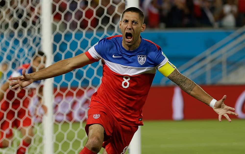 United States' Clint Dempsey celebrates after scoring the opening goal during the group G World Cup soccer match between Ghana and the United States at the Arena das Dunas in Natal, Brazil.