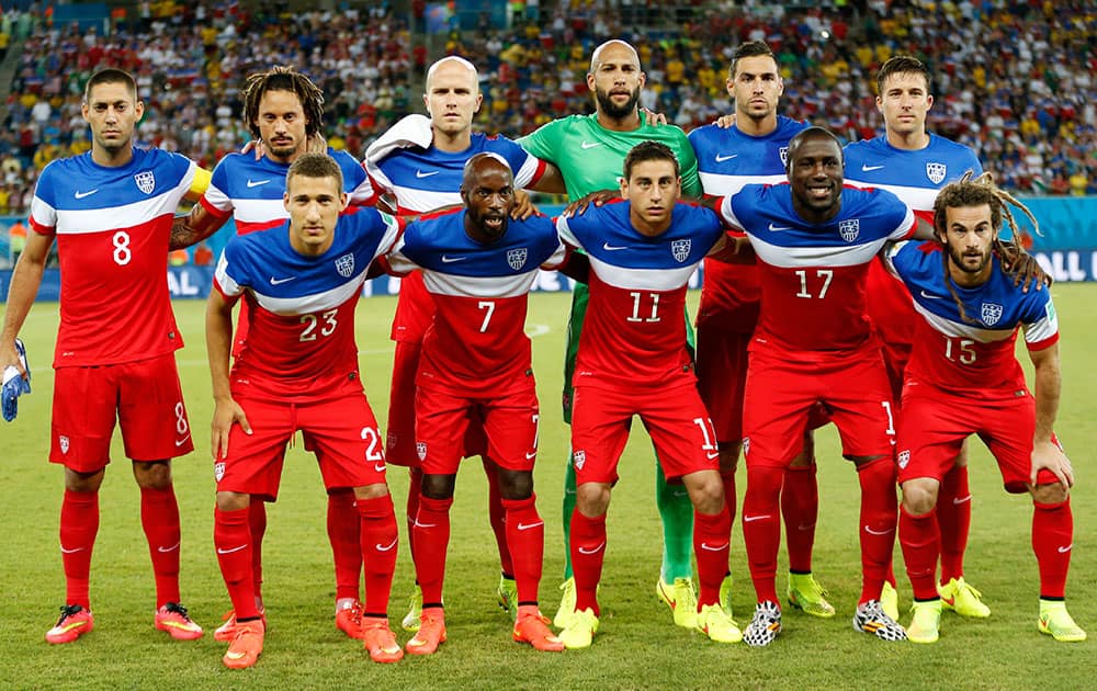 The USA team poses for a photo before the group G World Cup soccer match between Ghana and the United States at the Arena das Dunas in Natal, Brazil.