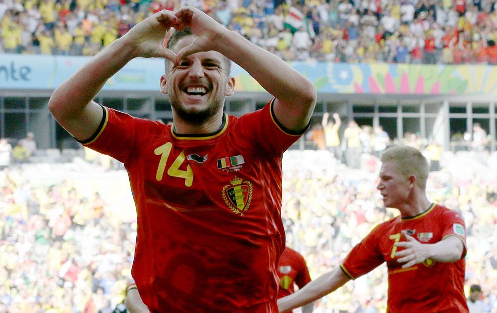 Belgium's Dries Mertens celebrates after scoring his side's second goal during the group H World Cup soccer match between Belgium and Algeria at the Mineirao Stadium in Belo Horizonte, Brazil.