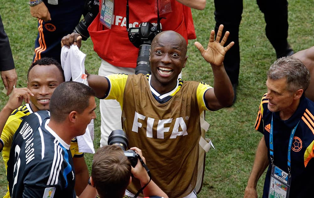 Colombia's Pablo Armero celebrates after the group C World Cup soccer match between Colombia and Ivory Coast at the Estadio Nacional in Brasilia.