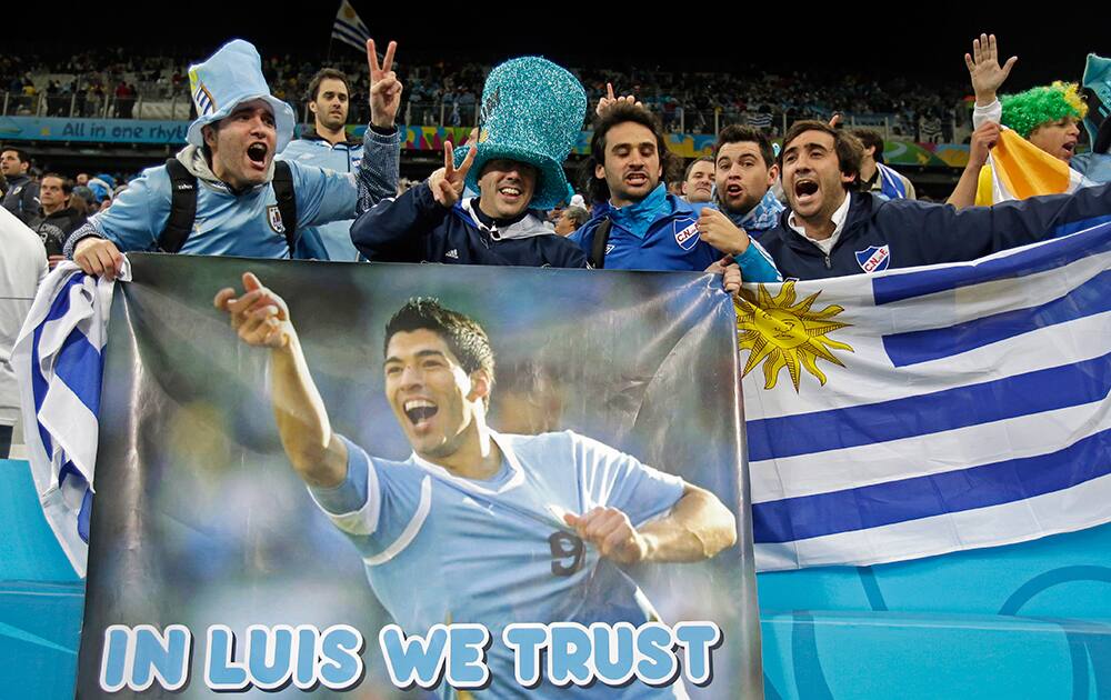 Uruguay fans celebrate after the group D World Cup soccer match between Uruguay and England at the Itaquerao Stadium in Sao Paulo, Brazil.