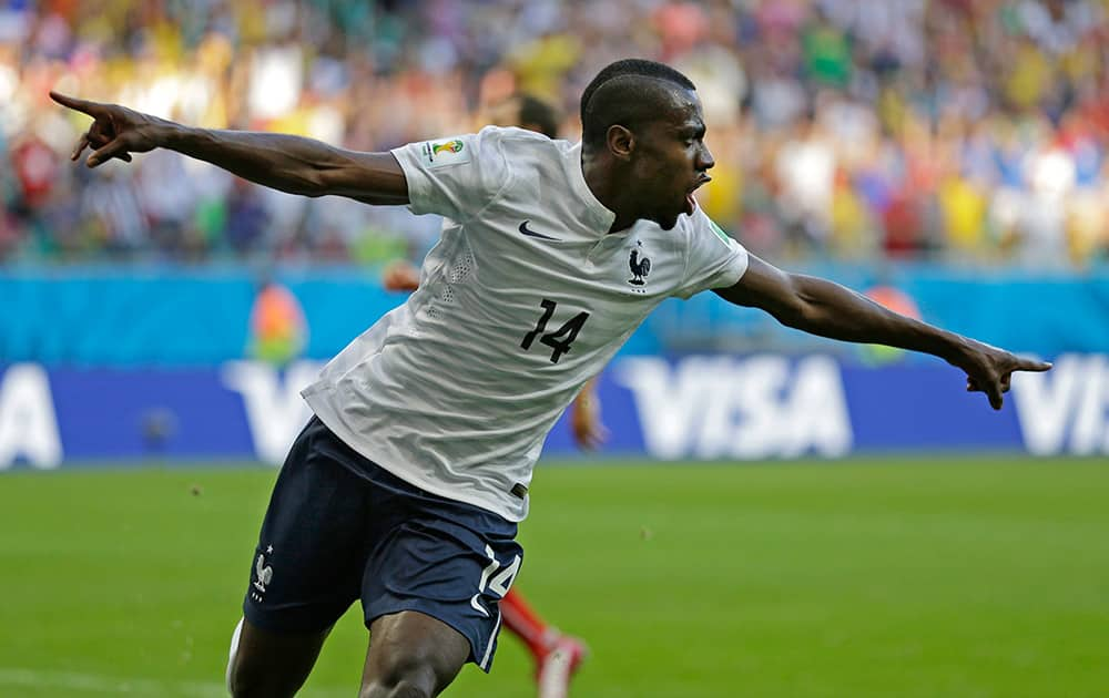 France's Blaise Matuidi celebrates after scoring his side's second goal during the group E World Cup soccer match between Switzerland and France at the Arena Fonte Nova in Salvador.