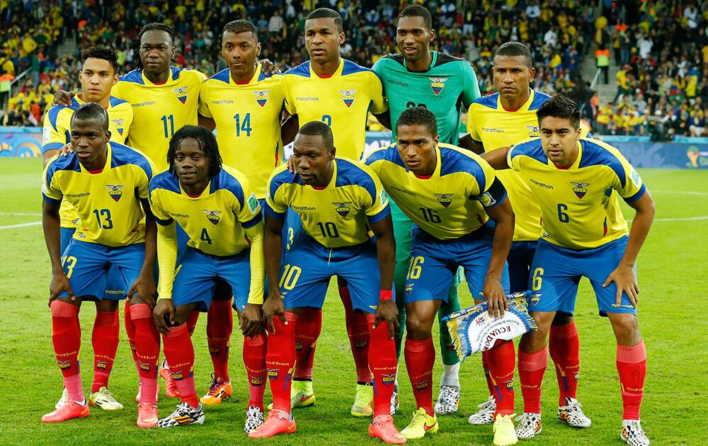 The Ecuador team pose for a group photo before the group E World Cup soccer match between Honduras and Ecuador at the Arena da Baixada in Curitiba, Brazil.