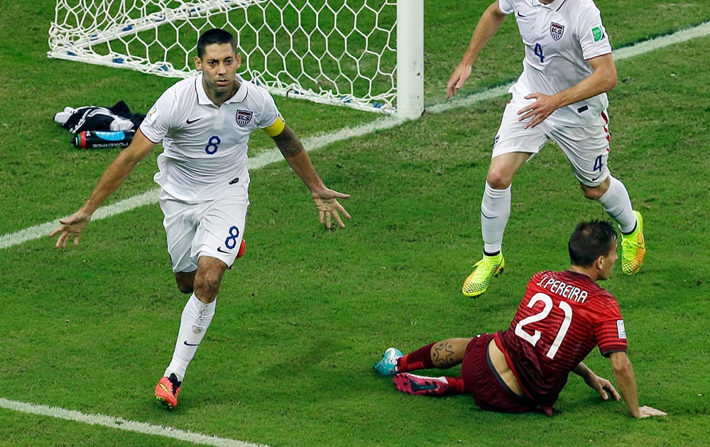 United States' Clint Dempsey celebrates scoring his side's second goal during the group G World Cup soccer match between the USA and Portugal at the Arena da Amazonia in Manaus, Brazil.