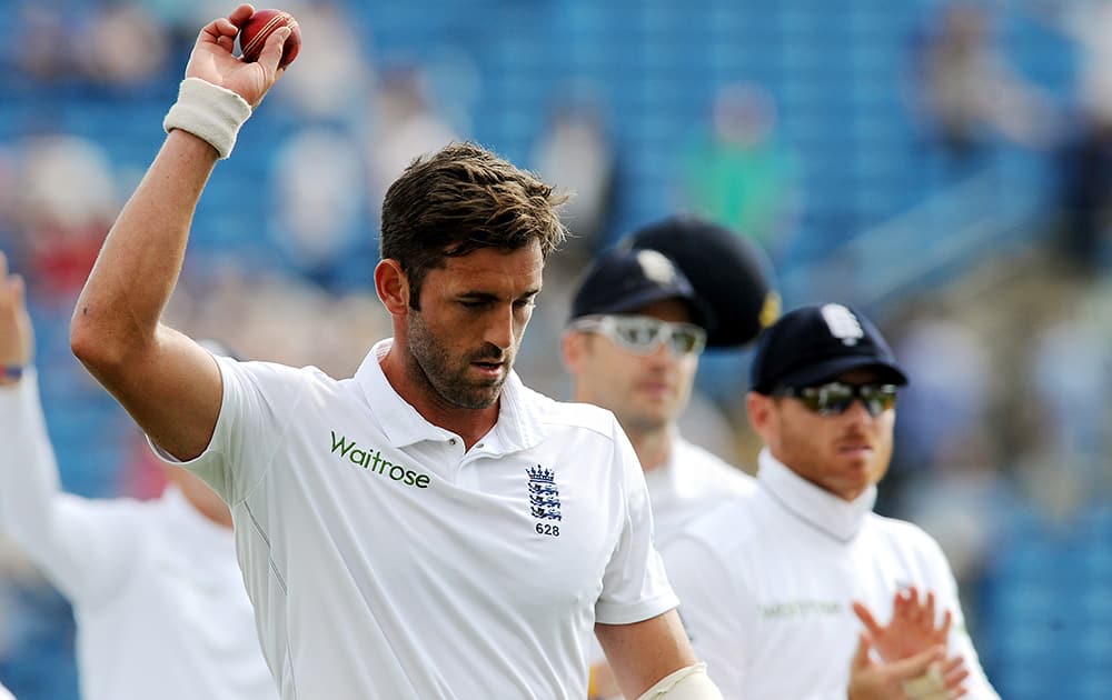 England's acknowledges fans with match ball after taking five wickets against Sri Lanka's during the Second Test Match at Headingley cricket ground, Leeds, England.