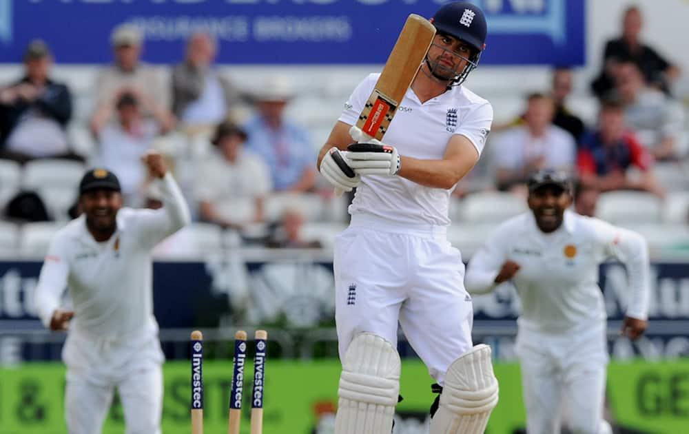 England's Alastair Cook is bowled by Sri Lanka's Dhammika Prasad for 16 runs during day four of the Second Test Match between England and Sri Lanka at Headingley cricket ground, Leeds, England.