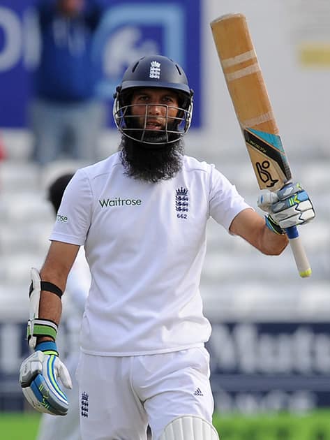 England's Moeen Ali celebrates a century during day five of the Second Test Match between England and Sri Lanka at Headingley cricket ground, Leeds, England.