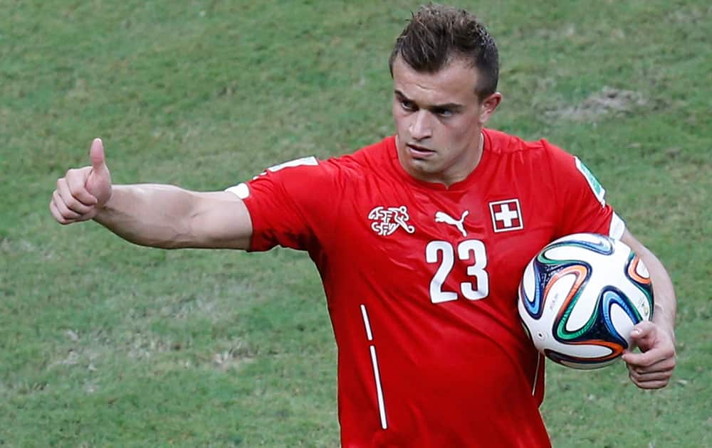 Switzerland's Xherdan Shaqiri reacts after Switzerland defeated Honduras, 3-0, during the group E World Cup soccer match between Honduras and Switzerland at the Arena da Amazonia in Manaus, Brazil.