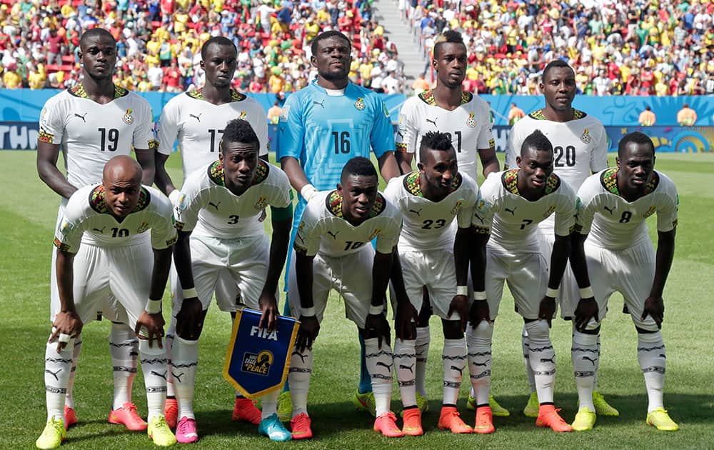 Ghana's players pose for photos during the group G World Cup soccer match between Portugal and Ghana at the Estadio Nacional in Brasilia, Brazil.