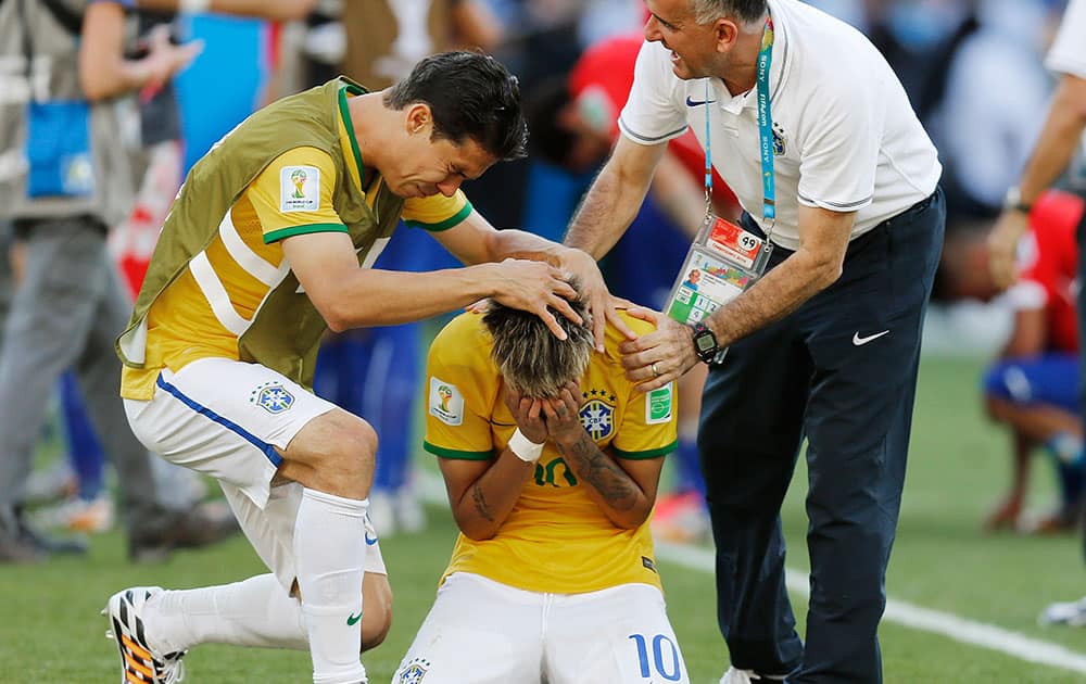 Brazil's Neymar reacts after the penalty shootout at the World Cup round of 16 soccer match between Brazil and Chile at Mineirao Stadium in Belo Horizonte, Brazil.