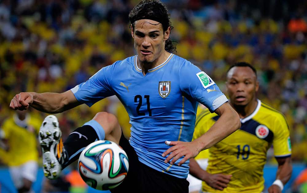 Uruguay's Edinson Cavani controls the ball during the World Cup round of 16 soccer match between Colombia and Uruguay at the Maracana Stadium in Rio de Janeiro, Brazil.