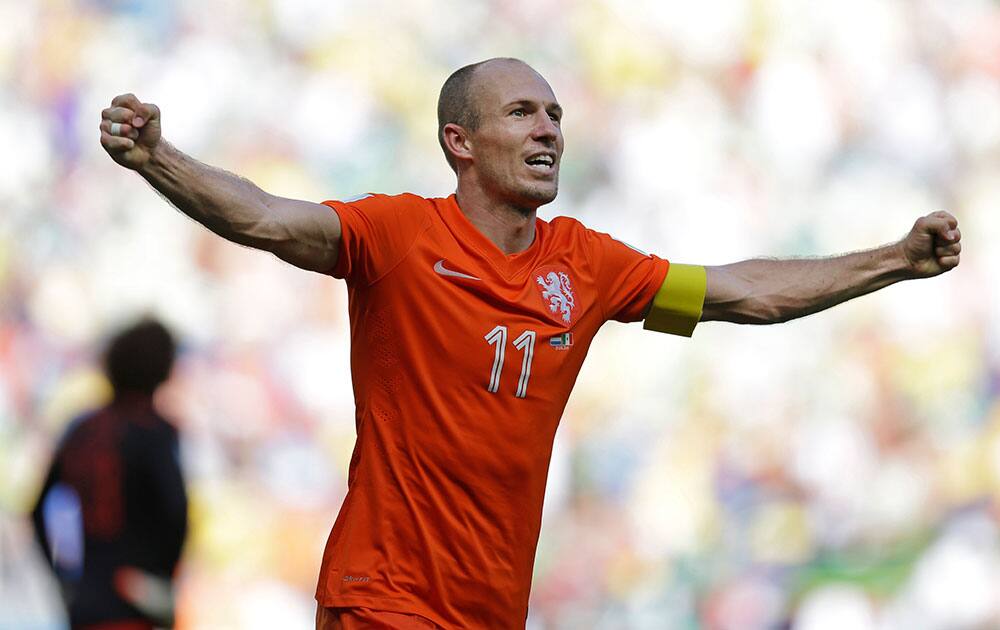 Netherlands' Arjen Robben celebrates after the World Cup round of 16 soccer match between the Netherlands and Mexico at the Arena Castelao in Fortaleza, Brazil.